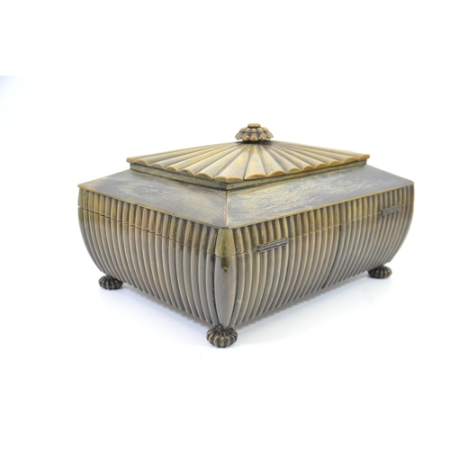 104 - An Anglo Indian, Vizagapatam, buffalo horn box, reeded bombe form with gadrooned finial, lined in sa... 