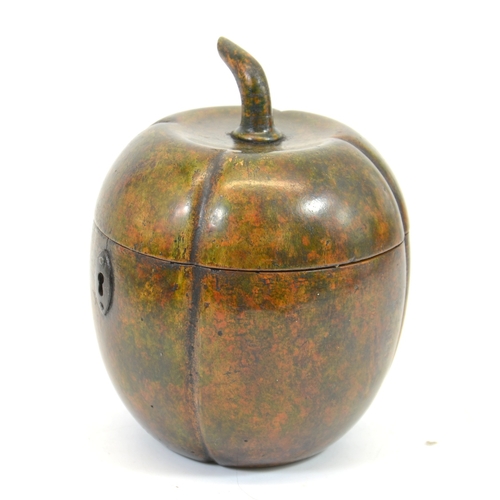 106 - A George III fruitwood melon form tea caddy, with white metal escutcheon, lobed ovoid form with stem... 