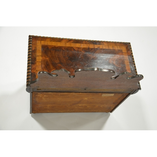 111 - A Victorian Irish miniature mahogany chiffonier, circa 1840, the carved back with eagles flanking a ... 