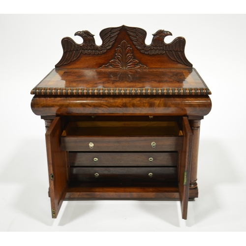 111 - A Victorian Irish miniature mahogany chiffonier, circa 1840, the carved back with eagles flanking a ... 