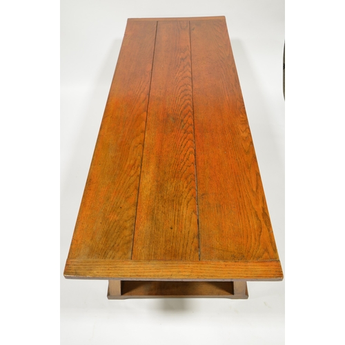 166 - Ambrose Heal for Heal and Sons, an Arts and Crafts oak Letchworth refectory table, three plank top w... 