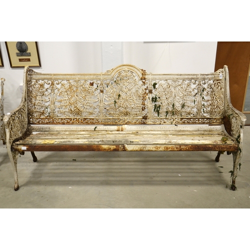 193 - A Victorian cast iron three seat garden bench, attributed to Coalbrookdale, fern and lily of the val... 