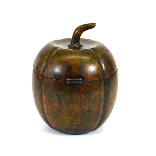 106 - A George III fruitwood melon form tea caddy, with white metal escutcheon, lobed ovoid form with stem... 