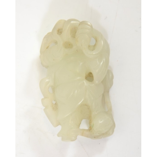 41 - A Chinese jade carving of a boy with broom, 5cm long