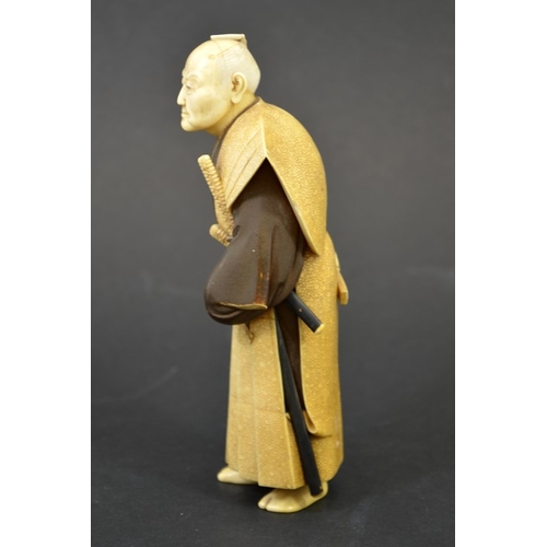 47 - λ A 19th century Japanese ivory okimono of an old Samurai warrior, Meiji, painted and carved with sh... 