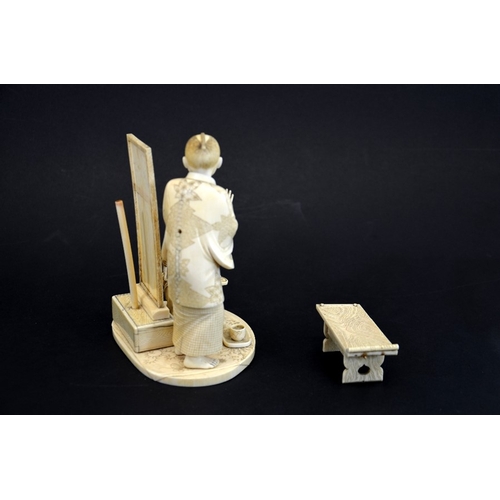 59 - λ A 19th century Japanese carved ivory okimono, Meiji, modelled as an art student and teacher, the c... 