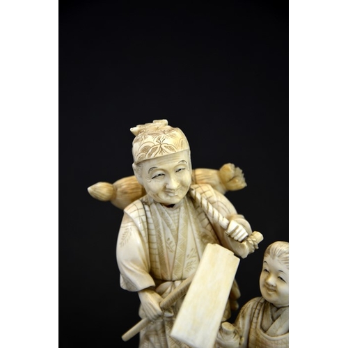 62 - λ A 19th century Japanese carved ivory okimono, Meiji, modelled as an elderly farmer and boy, carryi... 