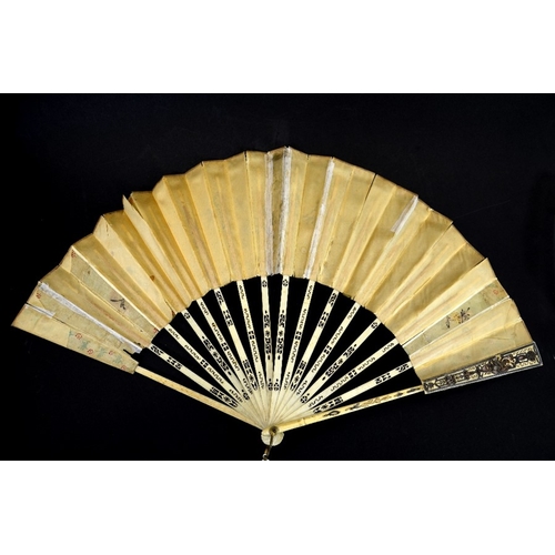 69 - λ A late 18th century hand painted silk and ivory fan, centrally painted with a rustic scene of figu... 