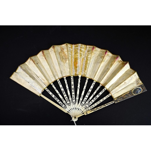 71 - λ A rare articulated  18th century ivory fan, the ivory sticks and guards finely carved, pierced, si... 