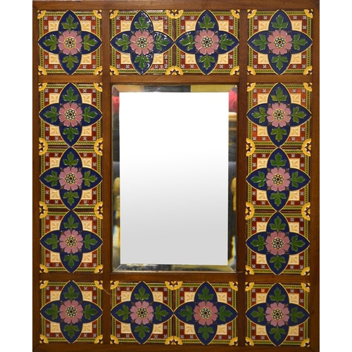 1312 - A W N Pugin for Minton, a tile panelled mirror, relief moulded Gothic revival quatrefoil rosette des... 