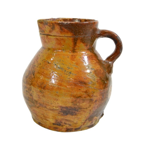 1314 - A mid to late 18th century West Country cider jug, gleaner glazed, circa 1760, 19.5cm high