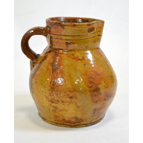 1314 - A mid to late 18th century West Country cider jug, gleaner glazed, circa 1760, 19.5cm high