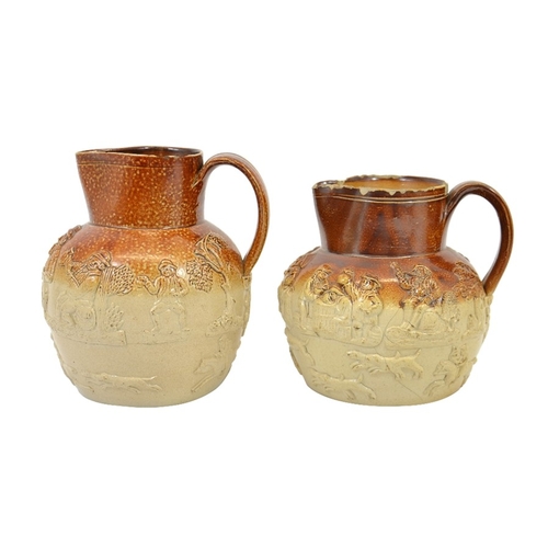 1318 - Two 19th century salt glazed stoneware hunting jugs, sprigged with tavern scenes, 19.5cm high (2)