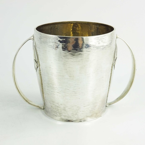 106 - Archibald Knox for Liberty and Co., an Arts and Crafts silver twin handled cup, Birmingham 1907, mod... 