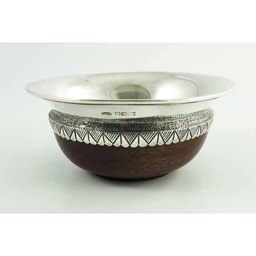 107 - An Elizabeth II Arts and Crafts style silver and turned wood mazer bowl, A E Jones, Birmingham 1968,... 