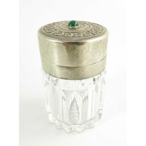 109 - A Secessionist silver and glass jar, probably Austrian circa 1910, the hinged lid cast with flowers ... 