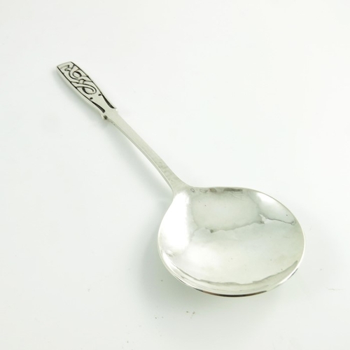 113 - Archibald Knox for Liberty and Co., a Celtic knot silver spoon, Birmingham 1936, model 341, planishe... 