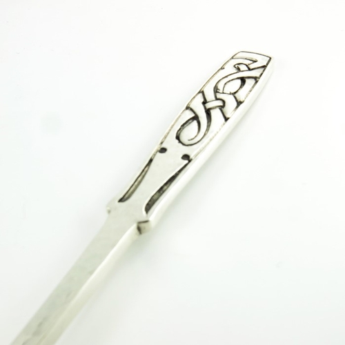 113 - Archibald Knox for Liberty and Co., a Celtic knot silver spoon, Birmingham 1936, model 341, planishe... 