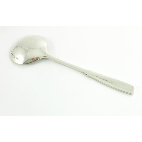 113 - Archibald Knox for Liberty and Co., a Celtic knot silver spoon, Birmingham 1936, model 341, planishe... 