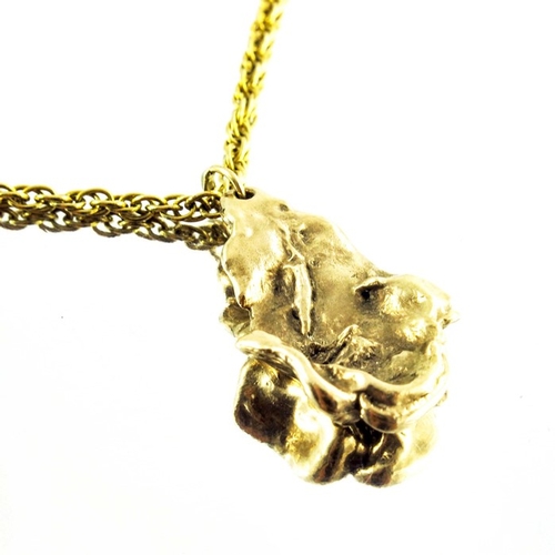 127 - A naturalistic gold nugget pendant on 9 carat gold chain, 3cm long, chain 43cm long, 15g