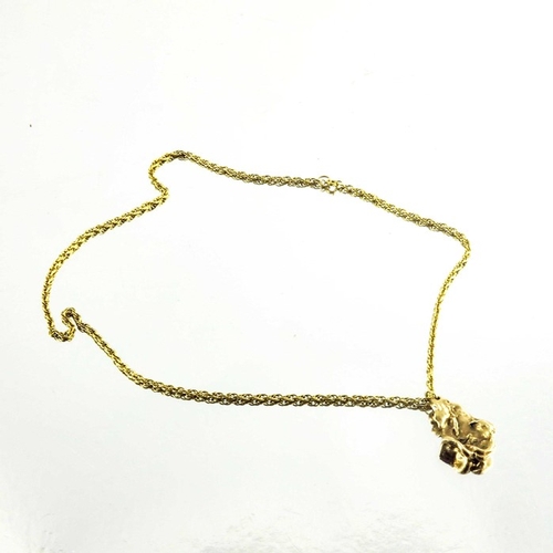 127 - A naturalistic gold nugget pendant on 9 carat gold chain, 3cm long, chain 43cm long, 15g