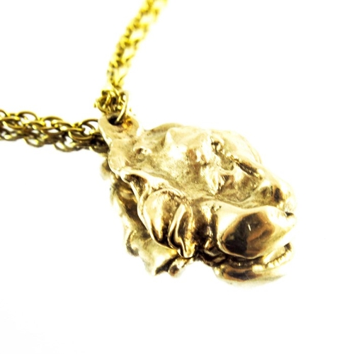 127 - A naturalistic gold nugget pendant on 9 carat gold chain, 3cm long, chain 43cm long, 15g