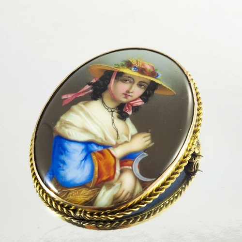 152 - A 9ct yellow gold and enamel oval brooch/pendant, with portrait painted in coloured enamels of a lad... 