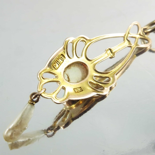 164 - Barnet Henry Joseph, an Arts and Crafts 9 carat gold, opal and pearl pendant, elongated open knotted... 