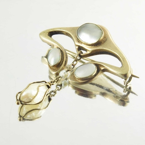 167 - Meyle and Mayer, a Jugendstil silver gilt, abelone and pearl brooch, the whiplash bud with vertical ... 