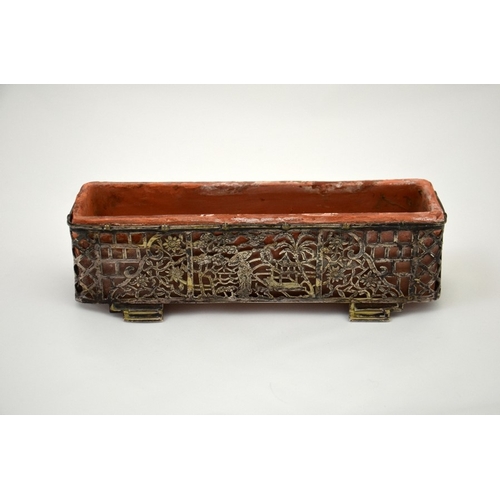 17 - A 800 European silver planter with a terracotta liner and an Oriental scene, 20cm long