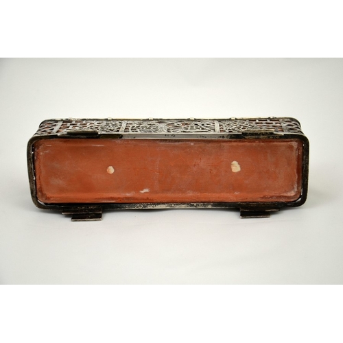 17 - A 800 European silver planter with a terracotta liner and an Oriental scene, 20cm long