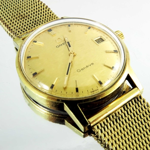 173 - A gentleman's Omega Genève wristwatch, gold plated with day date windows and matt gold dial, fitted ... 