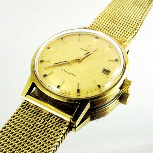 173 - A gentleman's Omega Genève wristwatch, gold plated with day date windows and matt gold dial, fitted ... 