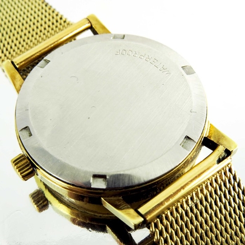 173 - A gentleman's Omega Genève wristwatch, gold plated with day date windows and matt gold dial, fitted ... 