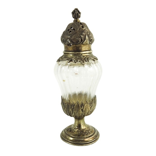 20 - A French silver gilt and cut glass pepper pot, HO, Paris circa 1890, pedestal bombe urn form, the do... 