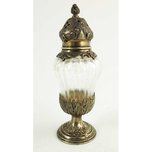 20 - A French silver gilt and cut glass pepper pot, HO, Paris circa 1890, pedestal bombe urn form, the do... 