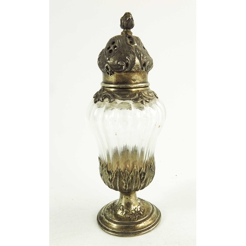 20 - A French silver gilt and cut glass pepper pot, HO, Paris circa 1890, pedestal bombe urn form, the do... 