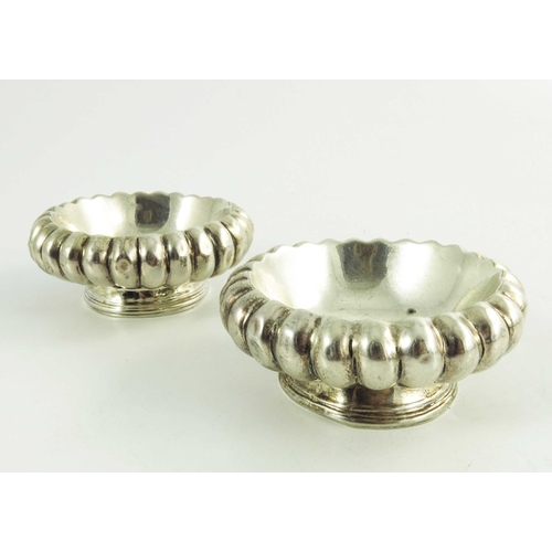 23 - A pair of George III Irish silver salt cellars, Christopher Haines, Dublin 1810, squat reeded form, ... 