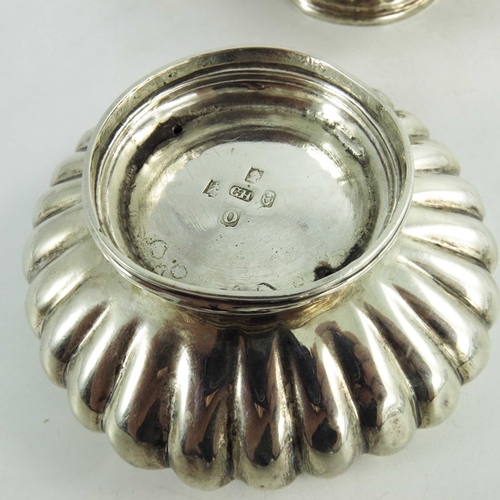 23 - A pair of George III Irish silver salt cellars, Christopher Haines, Dublin 1810, squat reeded form, ... 