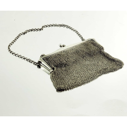 25 - A Victorian silver evening bag, stamped Birmingham 1893, the chain mesh rectangular bag mounted on s... 