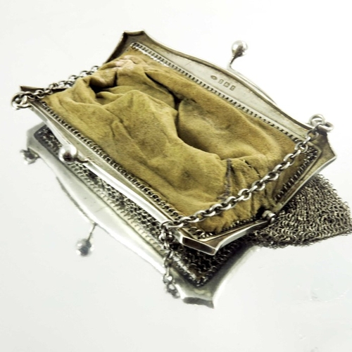 25 - A Victorian silver evening bag, stamped Birmingham 1893, the chain mesh rectangular bag mounted on s... 