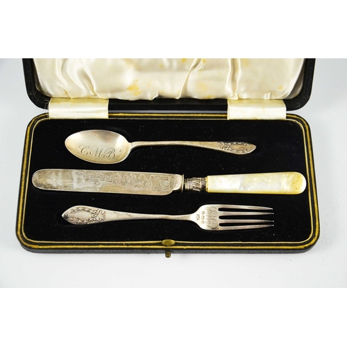 26 - An Edwardian silver christening set, Charles Wilkes, Birmingham 1909, including mother of pearl hand... 