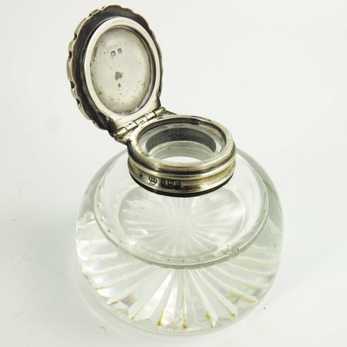 35 - A George V silver and glass inkwell, Synyer and Beddoes, Birmingham 1913, rounded body with star cut... 