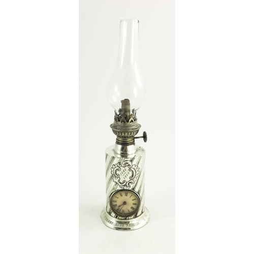 40 - A Victorian silver table oil lamp clock, James Deakin and Sons, Sheffield 1889, cylindrical form, wr... 