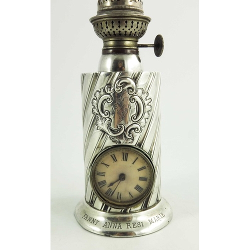 40 - A Victorian silver table oil lamp clock, James Deakin and Sons, Sheffield 1889, cylindrical form, wr... 