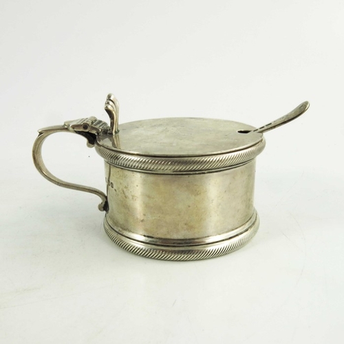 43 - Two Edwardian and George VI silver mustard pots, London 1910 and 1931, straight sided oval and cylin... 