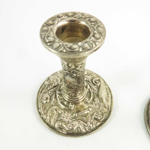 54 - A pair of Elizabeth II silver dwarf candlesticks, W I Broadway and Co., Birmingham 1969, heavily emb... 