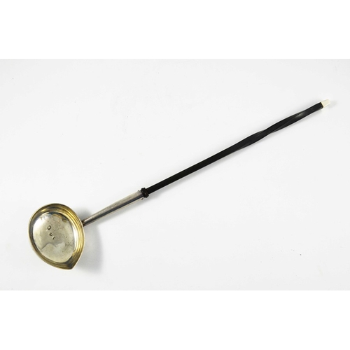 64 - A George II silver punch ladle, London 1736, oval form with pinched spout, twisted horn handle, 39.5... 