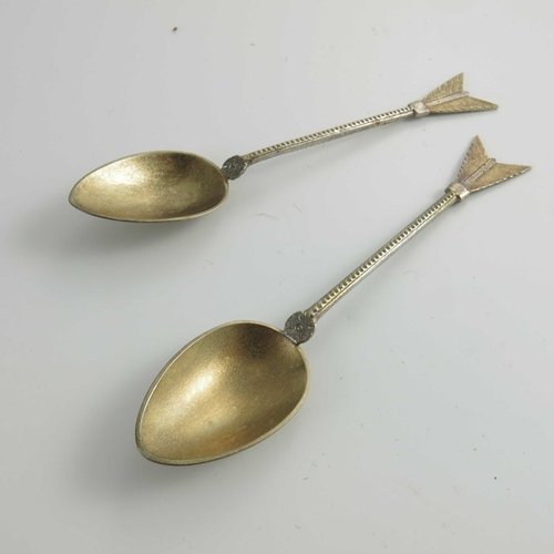 65 - A set of eleven Victorian silver gilt teaspoons, Martin, Hall and Co., Sheffield 1874, cast in the f... 