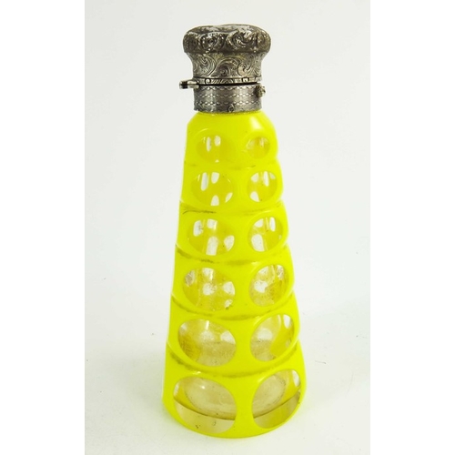 83 - A white metal mounted yellow over colourless cased glass scent bottle, 19th century, probably Bohemi... 